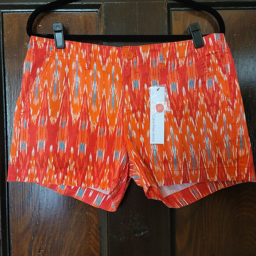 NWT Calvin Klein SHORTS orange size 10